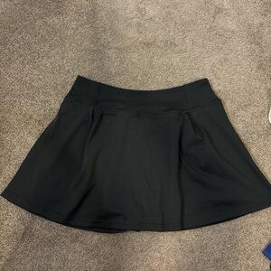 black and blue tennis skirt